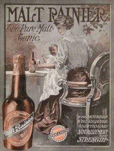 Image of Mother holding baby on her lap with a bottle of Malt Rainier in her hand.