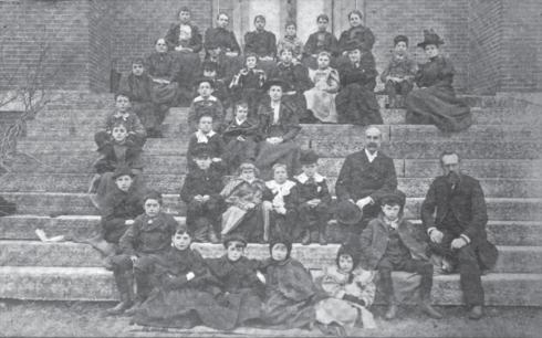 Posing in the shape of the CE monogram ca 1898