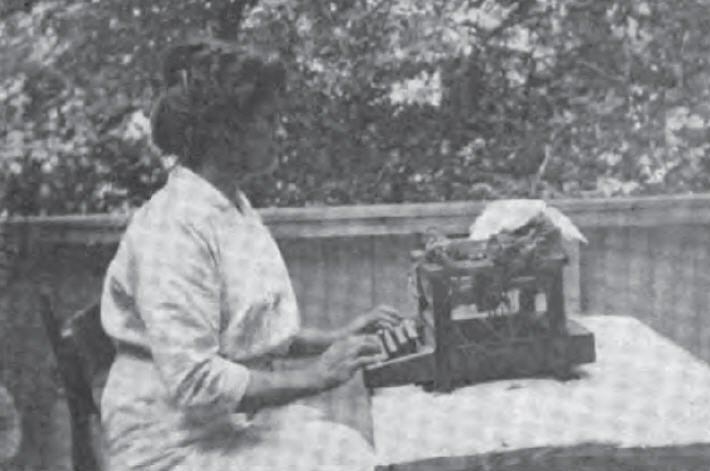 Grace working in the out of doors at her home in Swarthmore, PA. 1915.