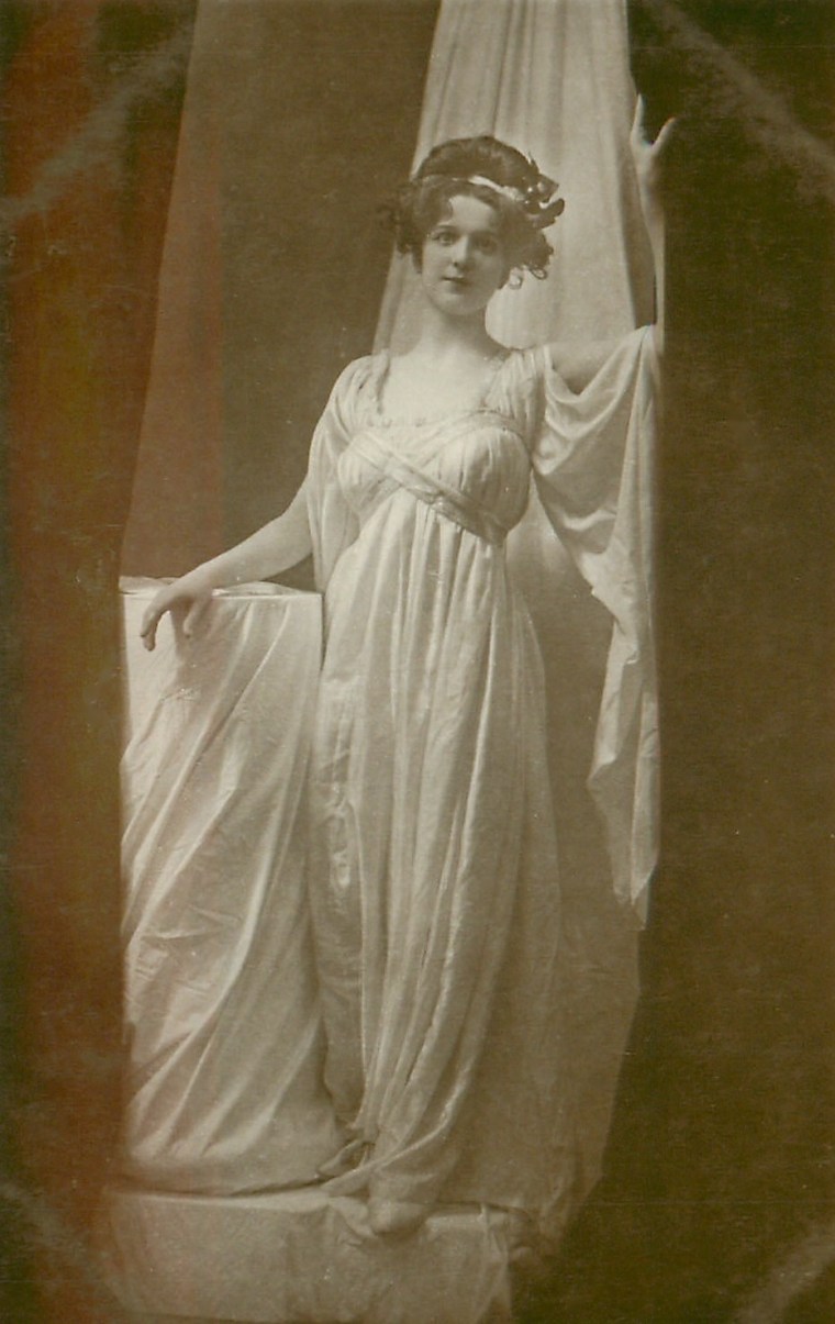 A woman in a classic Greek pose, 1903.
