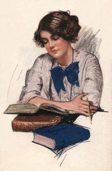 Young woman reads a thick book open on top of two other thick books. In her hand is a pencil.
