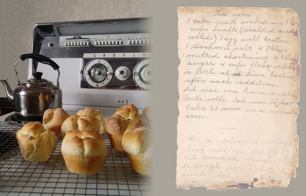Combined image of an old-fashioned stove top on the left. On top of the stove is a cooling rack with lightly browned tea rolls coolilng on top. ON the right side of the image is a hand-written recipe for "Tea rolls"